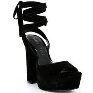 Dillard’s Gianni Bini Black Karstin Velvet Ankle Wrap-Up Platform Heels.